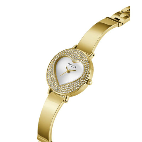 The Watch Boutique Guess Ladies Gold Tone Analog Watch with Heart‑Shaped Sunray Dial