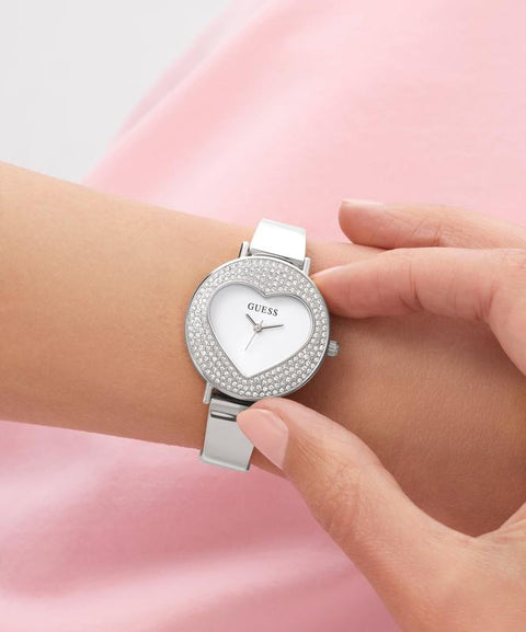 The Watch Boutique Guess Ladies Silver Tone Analog Watch with Heart-Shaped Dial