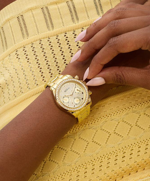 The Watch Boutique Guess Ladies Victoria Gold Tone Multi-Function Watch with Diamond-Studded Face