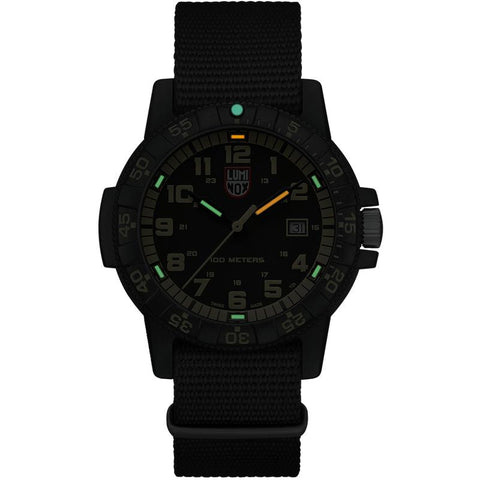 Luminox Leatherback SEA Turtle Giant 44mm watch with black CARBONOX case, orange dial accents, and durable black webbing strap.