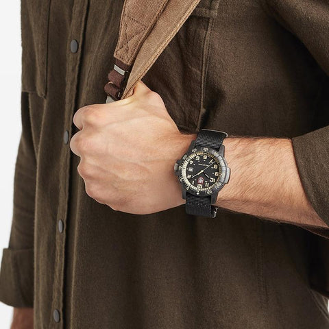 Luminox Leatherback SEA Turtle Giant 0333 watch with a black CARBONOX case, orange dial, and durable black webbing strap.