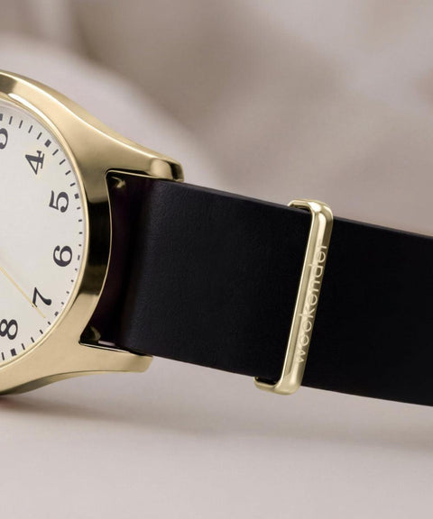 The Watch Boutique Timex Weekender New England Gold-Tone Black Leather Strap Watch